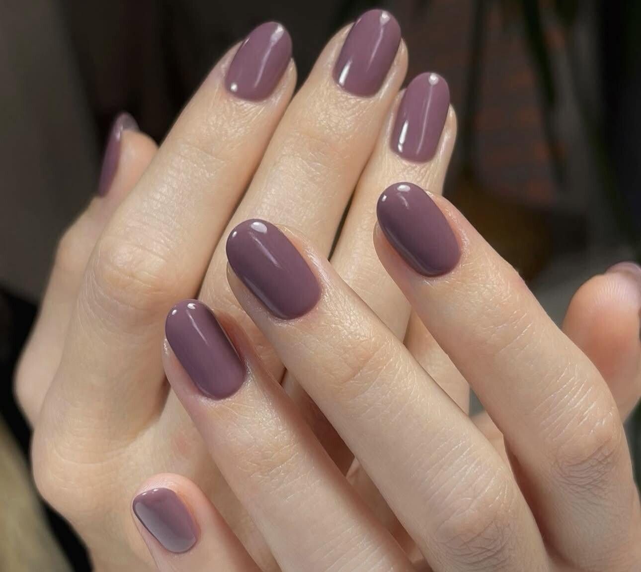 Dusty mauve gel manicure on natural oval nails
