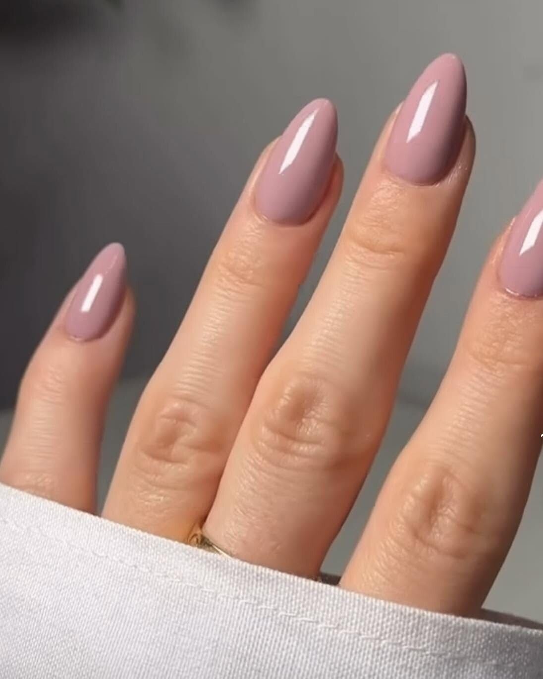 Elegant mauve nude almond-shaped nails
